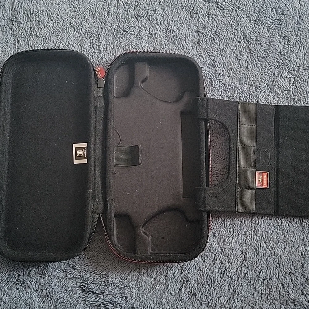 Nintendo Switch Game Traveler Deluxe Case, black, gently used.